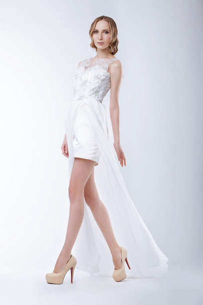Slender Fashion Model Wearing White Dress - 写真・画像
