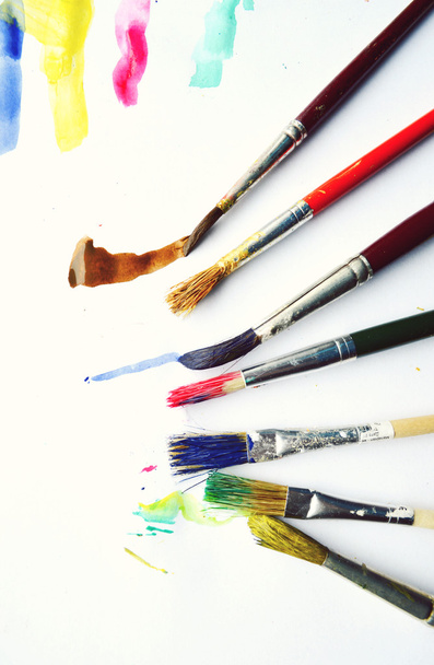 Painting, paint, brushes for painting, landscape paper, creativity on the wooden background - Photo, Image