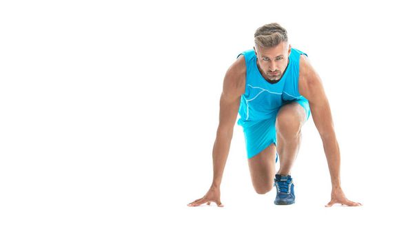 athletic man sport runner sportsman ready to start running isolated on white background with copy space banner. - Fotó, kép
