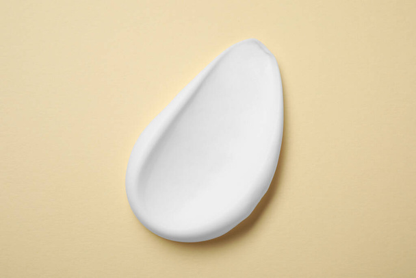 Sample of shaving foam on beige background, top view - Photo, Image