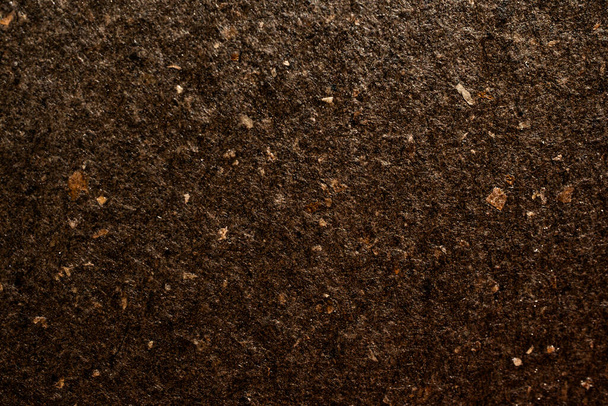 Macro detail of dark brown colored luxury artisan paper texture with natural fibres, recycled fine paper background - Foto, Imagem