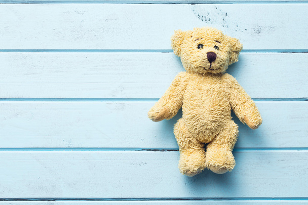 teddy bear on blue table - Photo, Image
