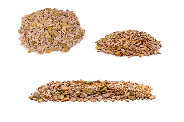 Mix of seeds for a salad. A pile of mixed seeds isolated on a white background.  - Foto, Imagem