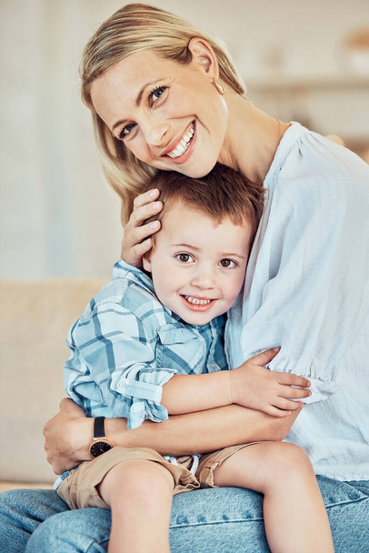 Portrait of woman, boy and hug in home for love, care and quality time together on mothers day. Happy mom, family and hugging cute son for support, comfort and childcare to relax in house with smile. - Fotografie, Obrázek