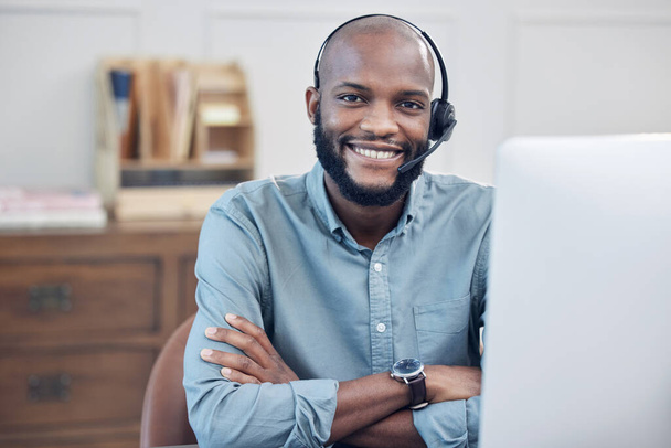 Black man, call center and arms crossed in portrait, smile or computer in customer service job at office. African male consultant, headset or happy at telemarketing agency, contact us or tech support. - Fotografie, Obrázek