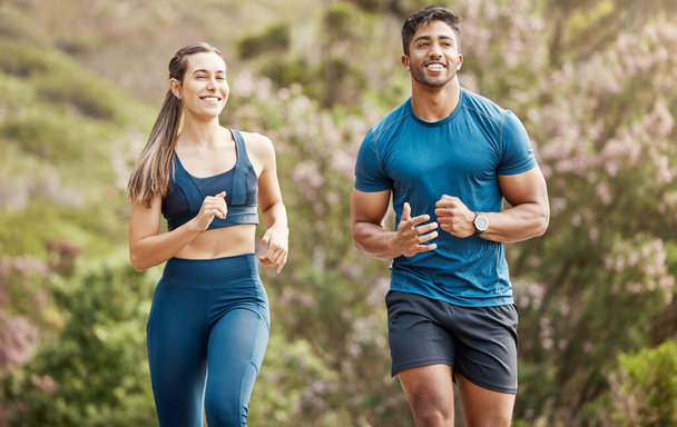 Running, mountain trail and couple of friends training for sports and health outdoor. Fitness, workout and sport run of young runner people together on a street with athlete exercise and race cardio. - Foto, Imagem