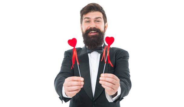 Cheerful gentleman in love. Businessman with beard mustache formal suit. Love and romance. Love euphoria. Romantic holiday. Man hold valentines heart. Happy man with red hearts. Completely in love. - Foto, Imagem