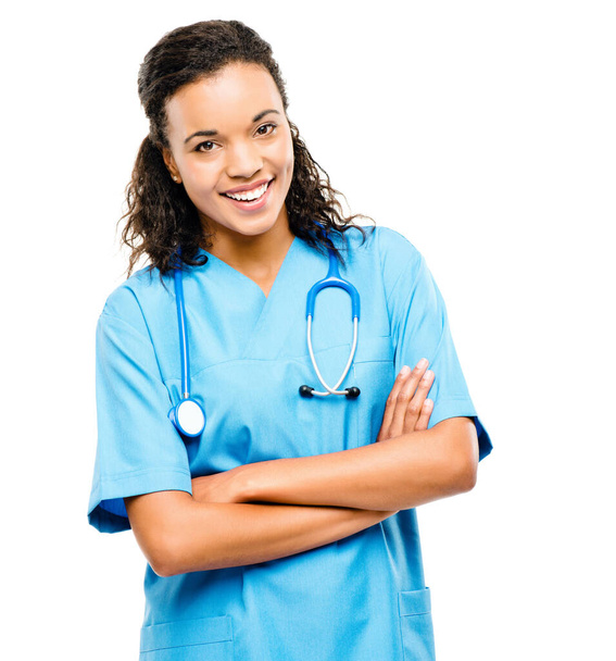 Arms crossed, portrait and a woman with healthcare pride isolated on a white background in a studio. Happy, doctor or a female nurse with confidence and smile for medical career or nursing service. - Foto, Imagem