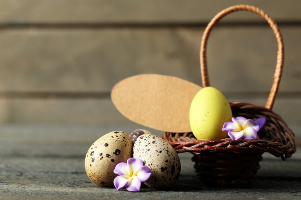 Bird eggs in wicker basket - Φωτογραφία, εικόνα
