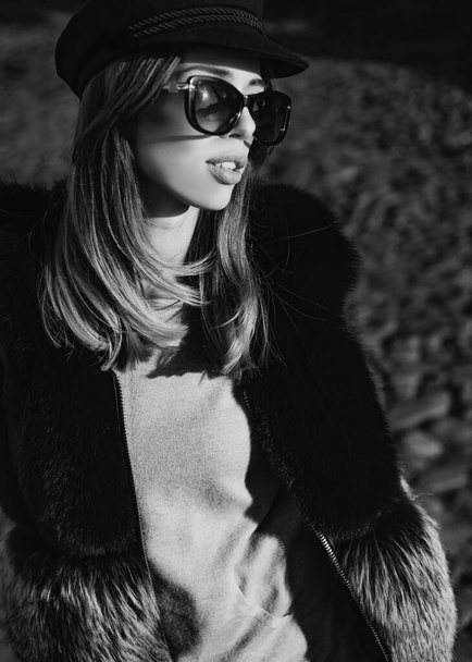 Eyewear trend. Pretty woman in hat and sunglasses and furry vest urban background. Fall fashion accessory. Enjoy fall season. Woman enjoy sunny day outdoors. Fall outfit. Modern casual outfit. - Fotoğraf, Görsel