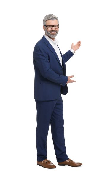 Mature businessman in stylish clothes posing on white background - Photo, image