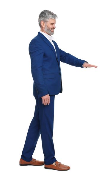 Mature businessman in stylish clothes posing on white background - Photo, Image