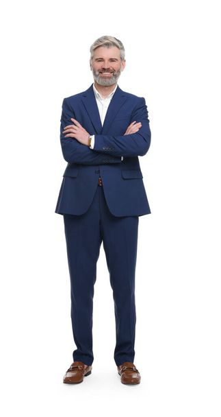 Mature businessman in stylish clothes posing on white background - Photo, image