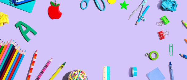 Collection of school supplies overhead view - flat lay - 写真・画像