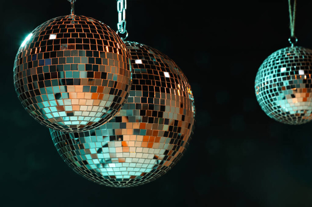 Shiny bright disco balls on dark background - Photo, image
