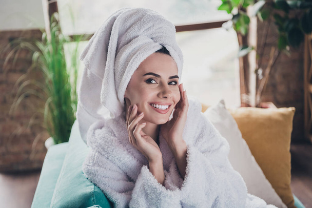 Photo of joyful lady spa hotel resort visitor enjoying botox face skin procedure in comfort cozy interior. - Фото, изображение