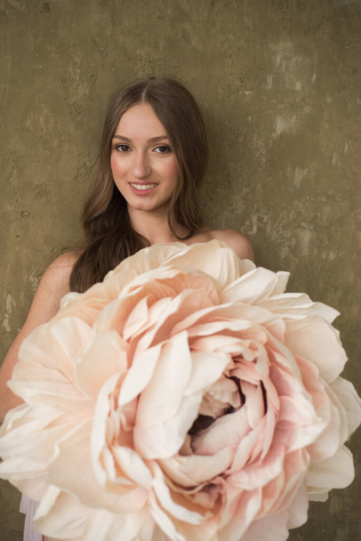 portrait of a beautiful bride with a bouquet in a wedding dress  - Zdjęcie, obraz