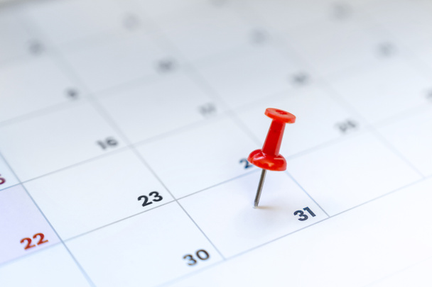 Czerwony pinezka w kalendarzu 31 dzień miesiąca, Sylwester - Zdjęcie, obraz