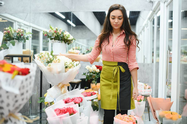 Startup successful sme small business entrepreneur owner woman standing with flowers at florist shop service job. Portrait of caucasian girl successful owner environment friendly concept banner. - Fotografie, Obrázek