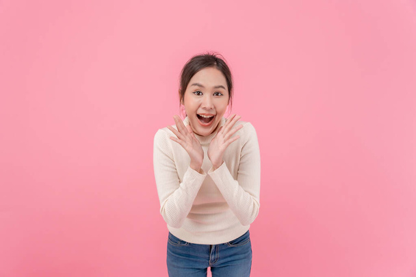 Asian beautiful woman exited surprise face expression . female feels shocked. exciting smile and happy adorable rejoices. Very enjoy and fun relax time. wow, girl holding smartphone. Smile. - Foto, Bild