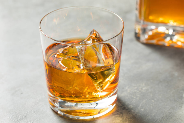 Boozy Refreshing Bourbon Whiskey on the Rocks Ready to Drink - Фото, изображение