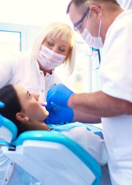 Doctor and patient in the dental clinic. - Photo, Image