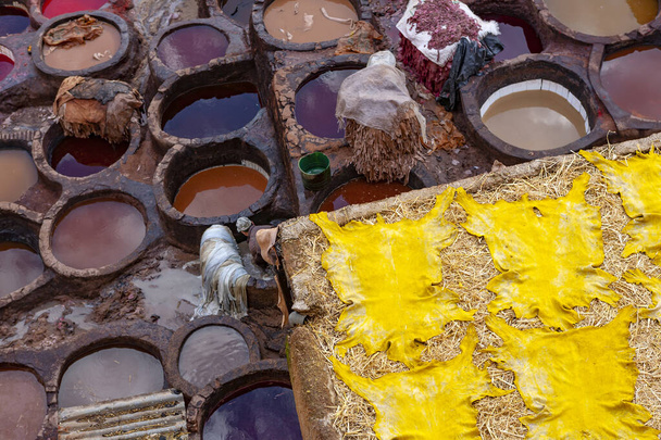 The traditional tannery in the heart of the medina of Fez Morocco with dye wells - Photo, Image