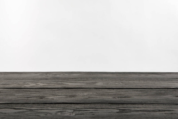 Empty grey wooden surface on white background. Space for text - Foto, Imagen