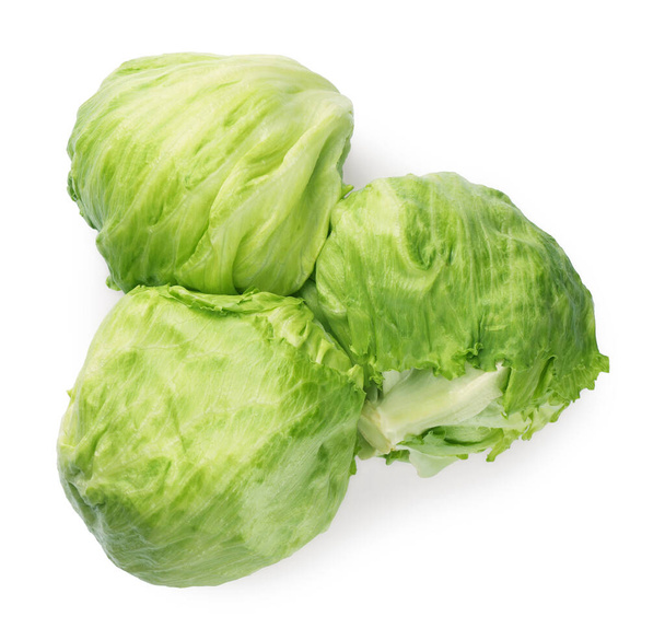 Fresh green iceberg lettuces isolated on white, top view - Foto, afbeelding