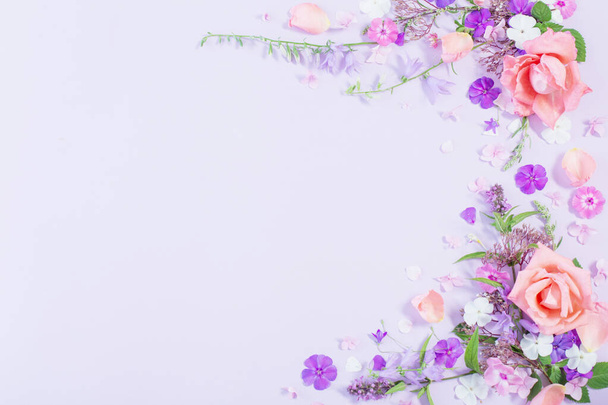 pattern of summer flowers on color paper background - Foto, Imagen