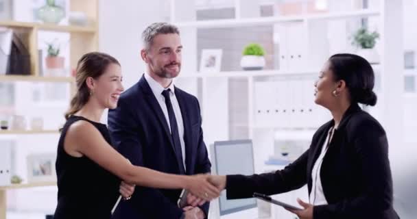 Handshake, recruitment or business people in a job interview or meeting process at human resources. Woman, hiring opportunity or hr manager shaking hands with a happy candidate for a company vacancy. - Footage, Video