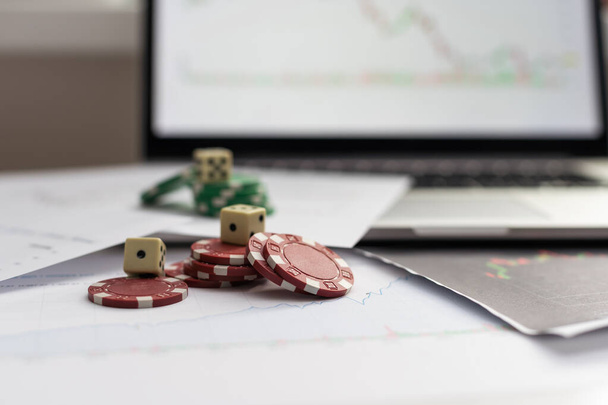 Dices cubes to trader. Cubes with the words SELL BUY on financial chart and columns of quotations as background. Selective focus. High quality photo - Photo, Image