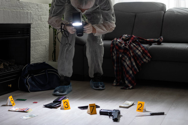 Crime scene investigation - collecting evidence. High quality photo - Photo, Image