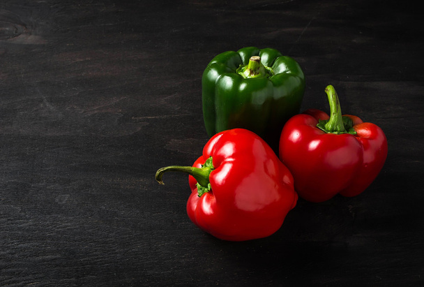 Sweet Bulgarian pepper on dark background - Фото, зображення