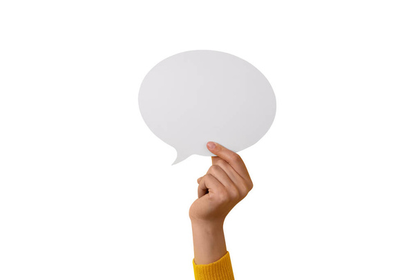 Dialogue icon, blank speech bubble in hand isolated on white background - Фото, изображение
