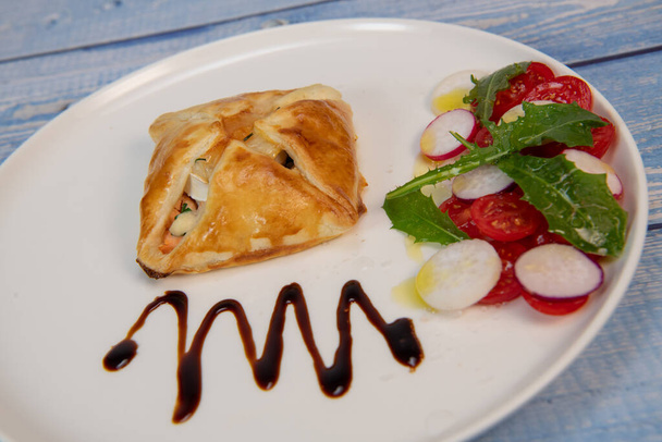 Salmon and goat cheese puff pastry recipe. High quality photo - Фото, зображення
