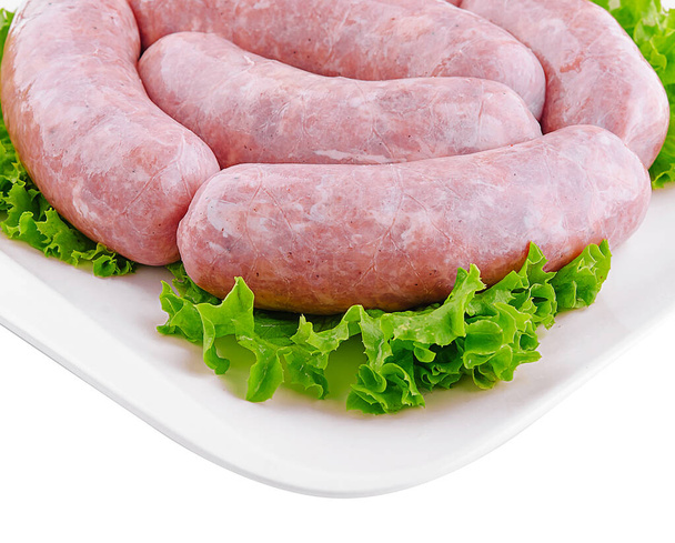 Fresh raw pork bratwurst isolated on a white background - Photo, Image