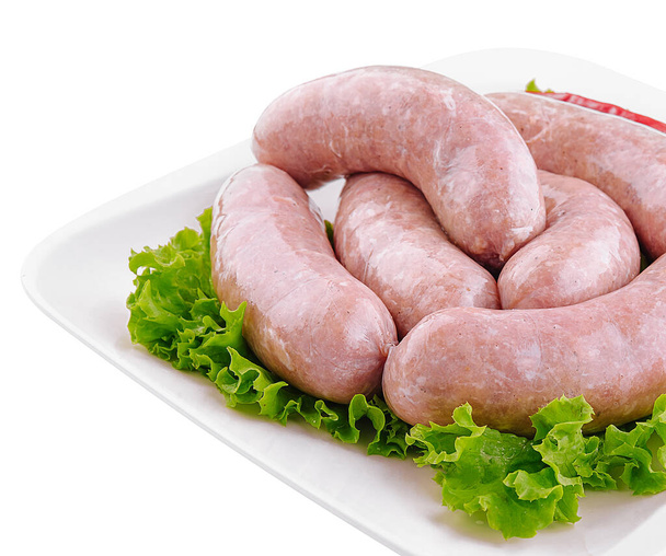 Fresh raw pork bratwurst isolated on a white background - Φωτογραφία, εικόνα