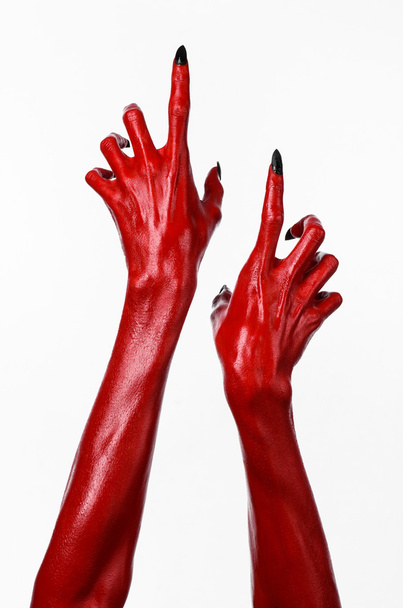 Red Devil's hands, red hands of Satan, Halloween theme, white background, isolated - Zdjęcie, obraz
