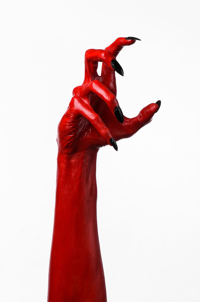 Red Devil's hands, red hands of Satan, Halloween theme, white background, isolated - Photo, Image