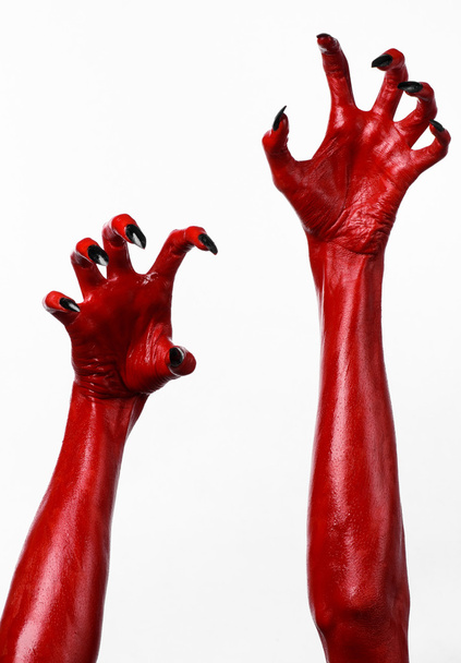 Red Devil's hands, red hands of Satan, Halloween theme, white background, isolated - Fotoğraf, Görsel