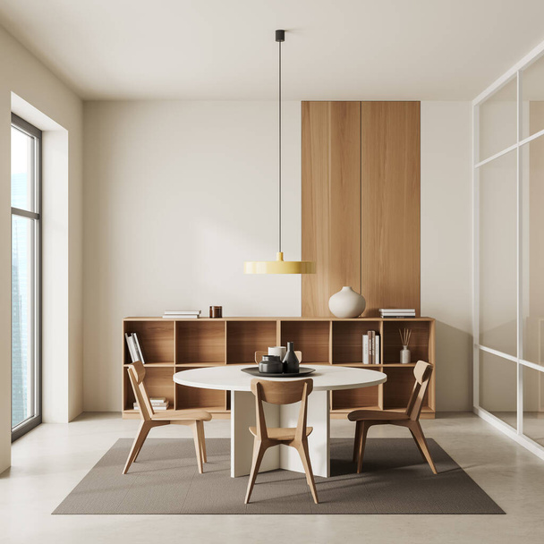 Beige meeting room interior with eating table and chairs on carpet, light concrete floor. Shelf with books and stylish decoration. Panoramic window on city view. 3D rendering - Фото, зображення