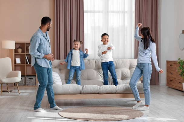 Happy international family spending time together at home - Zdjęcie, obraz