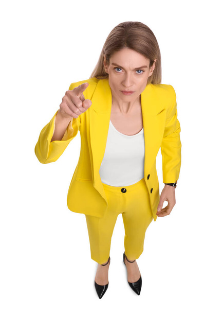 Beautiful businesswoman pointing on white background, above view - Fotó, kép