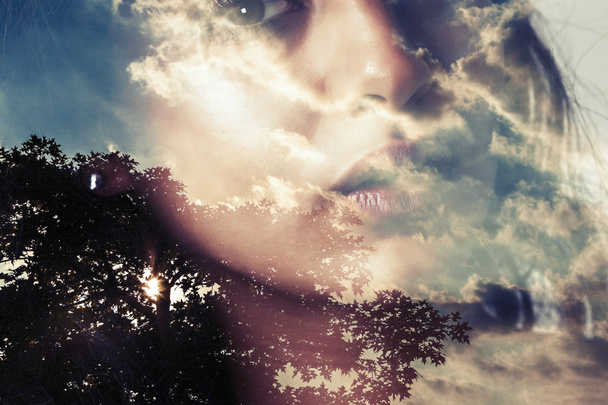 Double exposure of girl and tree silhouette with clouds - Фото, зображення