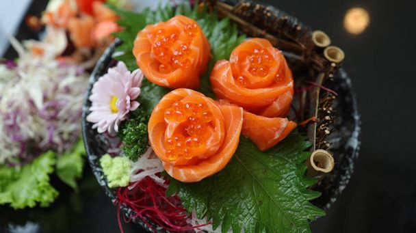 Salmon Sushi Japanese food. on the table in restaurant. Japanese cuisine Sashimi Salmon sushi nigiri - Foto, Imagen