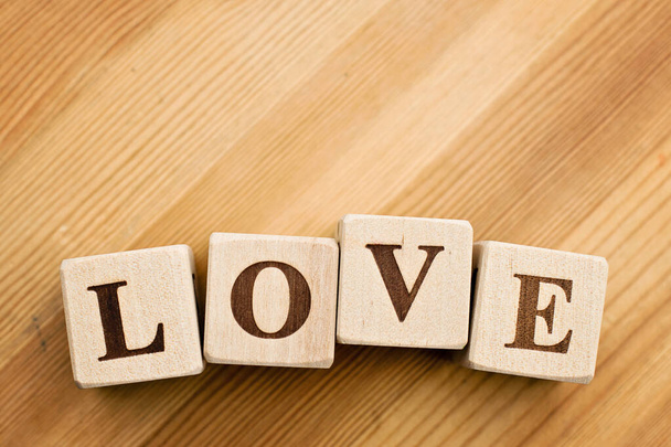 Love word written in wooden blocks - Fotoğraf, Görsel