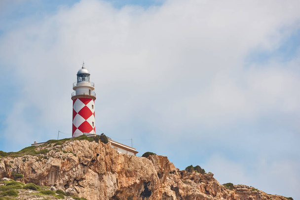 Picturesque lighthouse in Cabrera island, Balearic archipelago. Mediterranean coastline. Spain - Foto, afbeelding