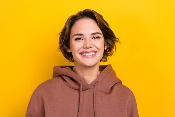 Closeup photo of young adorable lady white toothy smile wear hoodie shirt isolated yellow bright color background. - Foto, immagini