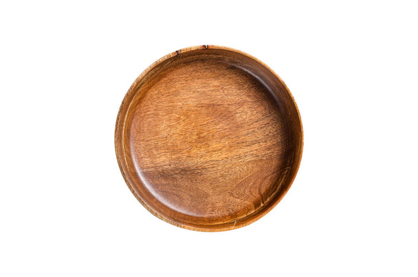Table setting with vintage empty wooden plate on rustic wood. Isolated on white background - Photo, Image